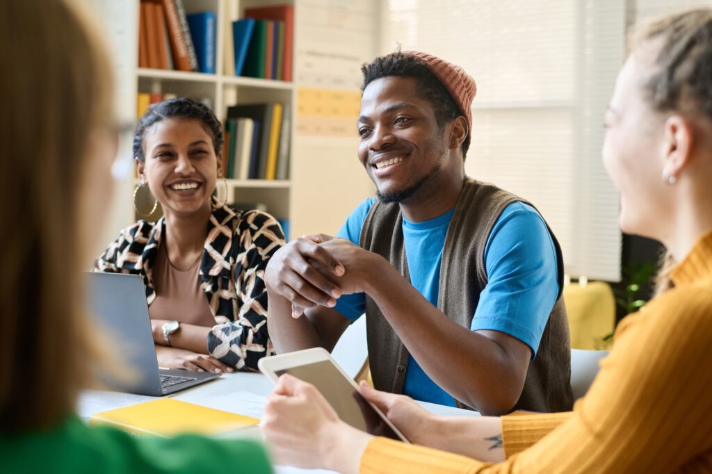 Smiling Black Student Speaking in Class